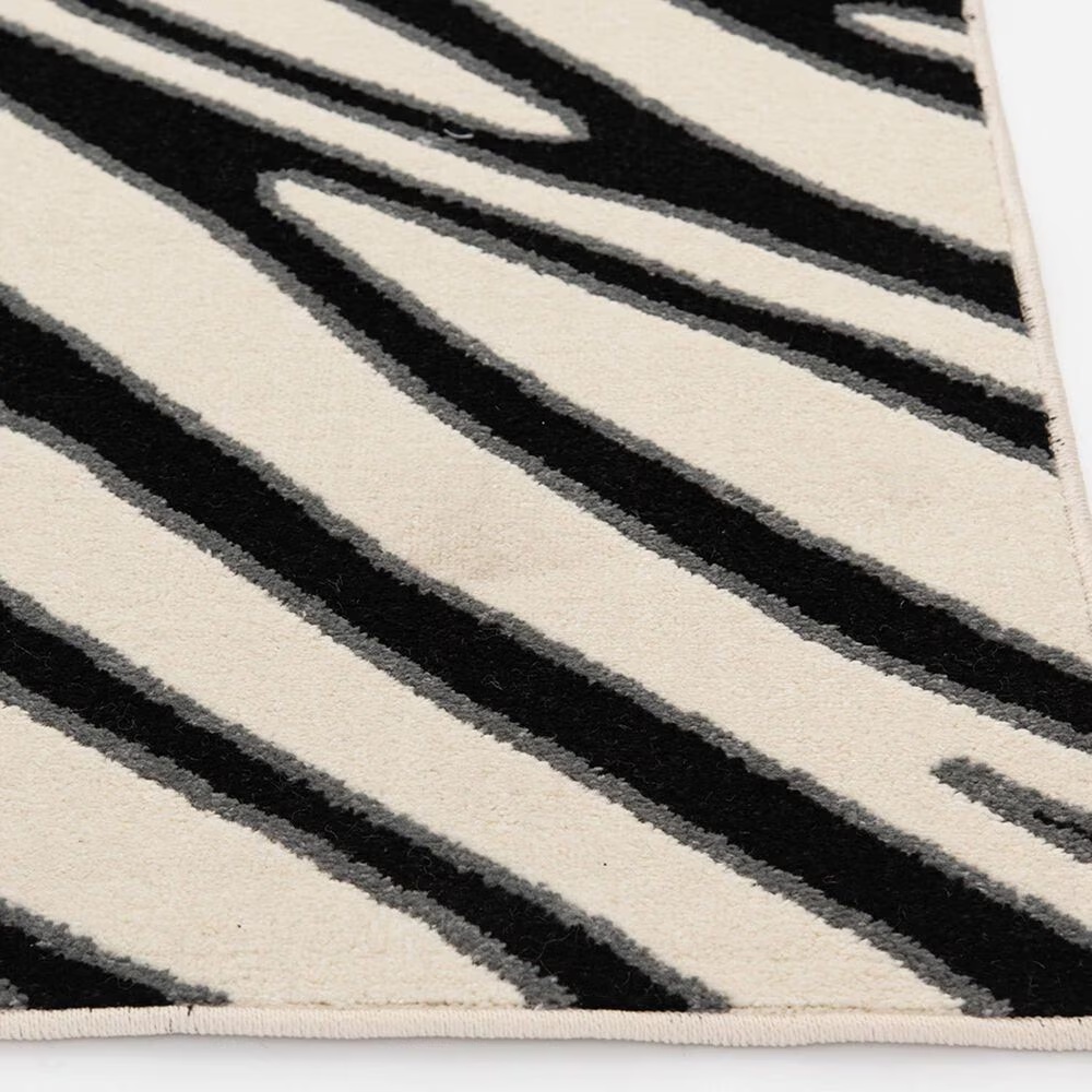 65771-central-oriental-terrace-tropic-jayla-5-x-7-3-white-and-black-area-rug-1.jpg