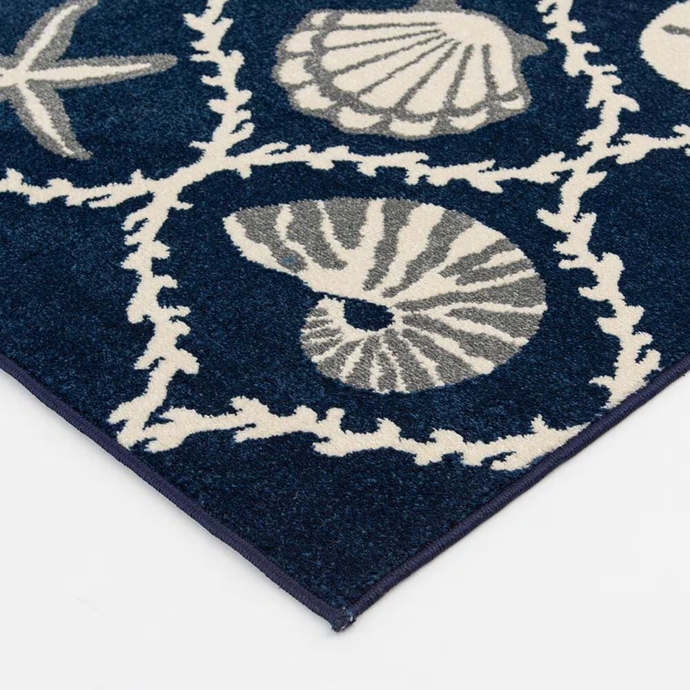65796-central-oriental-terrace-tropic-coastal-coral-lattice-7-10-x-9-10-sapphire-and-snow-area-rug-1.jpg
