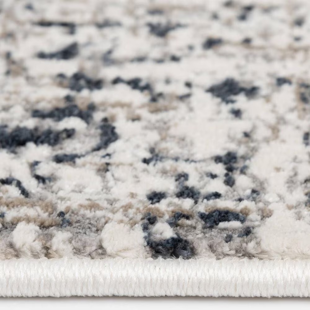 68799-central-oriental-clearwater-olinda-5-3-x-7-7-grey-and-white-area-rug-1.jpg
