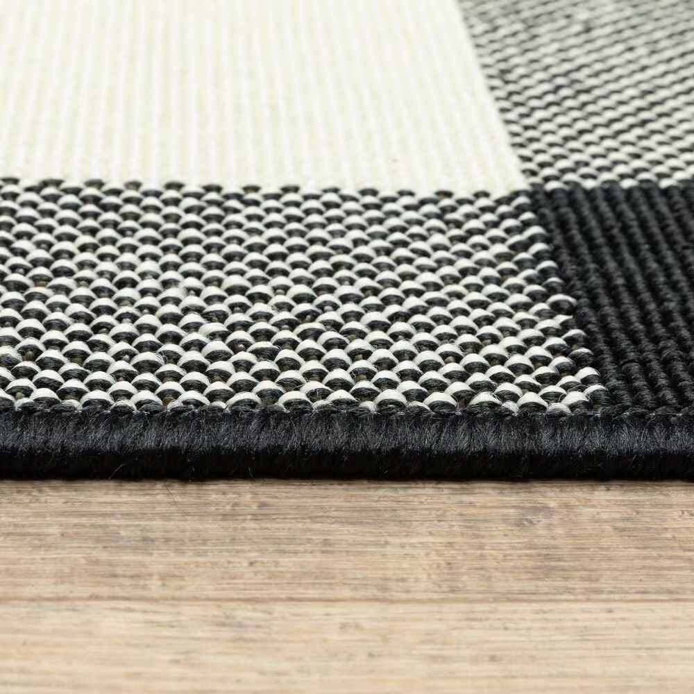69090-oriental-weavers-marina-black-and-ivory-7-10-x-10-10-indoor-outdoor-area-rug-1.jpg