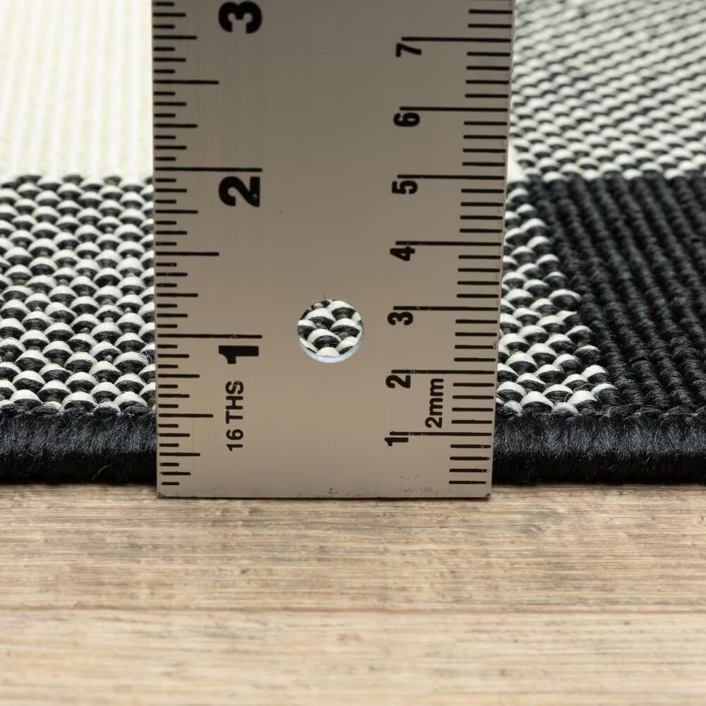 69090-oriental-weavers-marina-black-and-ivory-7-10-x-10-10-indoor-outdoor-area-rug-1.jpg
