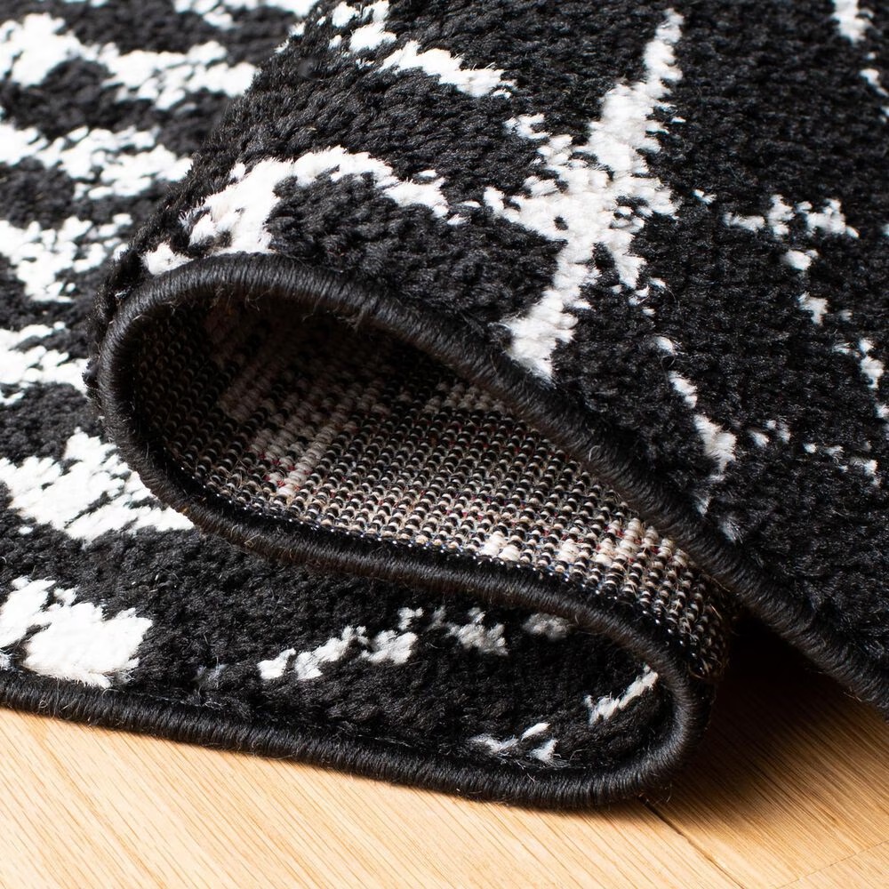 79123-safavieh-tulum-2-x-5-black-and-ivory-runner-1.jpg