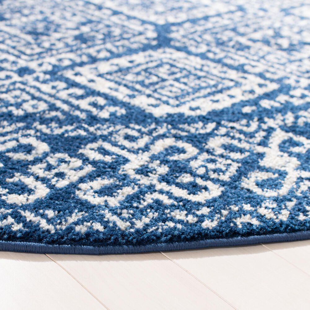 79404-safavieh-tulum-traditional-6-7-round-ivory-and-navy-area-rug-1.jpg