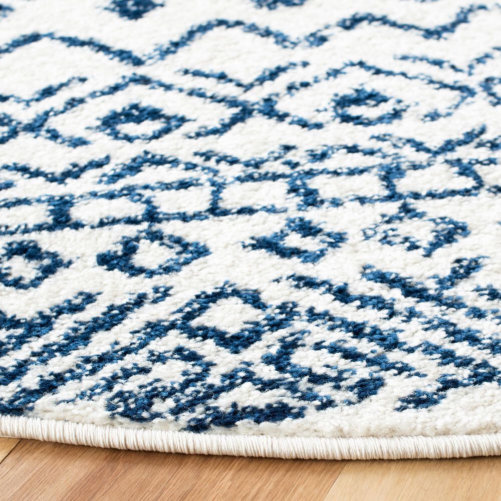 79610-safavieh-tulum-transitional6-7-round-ivory-and-navy-area-rug-1.jpg