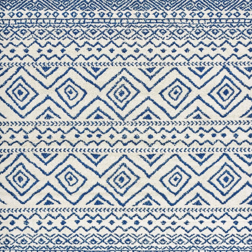 79610-safavieh-tulum-transitional6-7-round-ivory-and-navy-area-rug-1.jpg