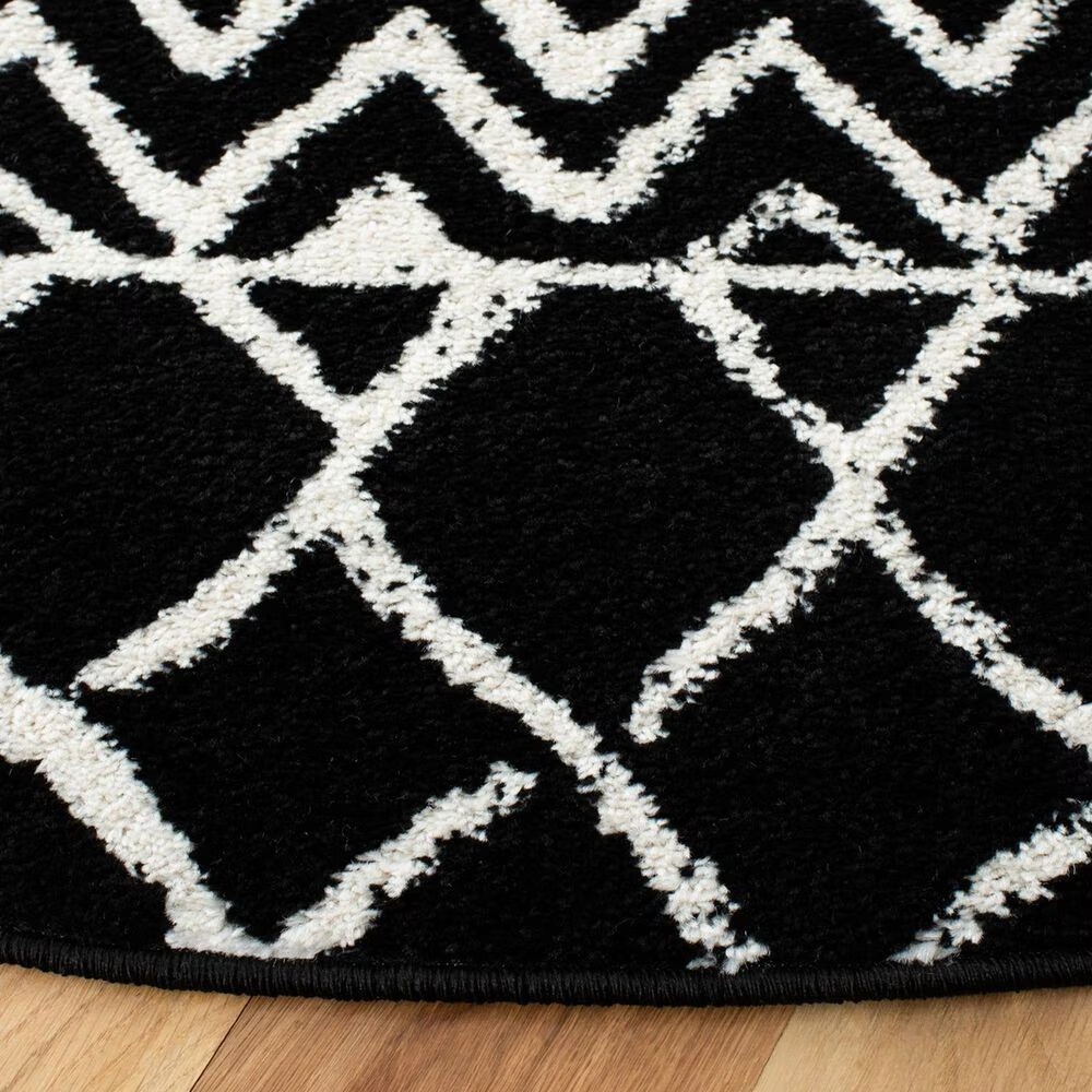 80324-safavieh-tulum-tul270-6-7-round-black-and-ivory-area-rug-1.jpg