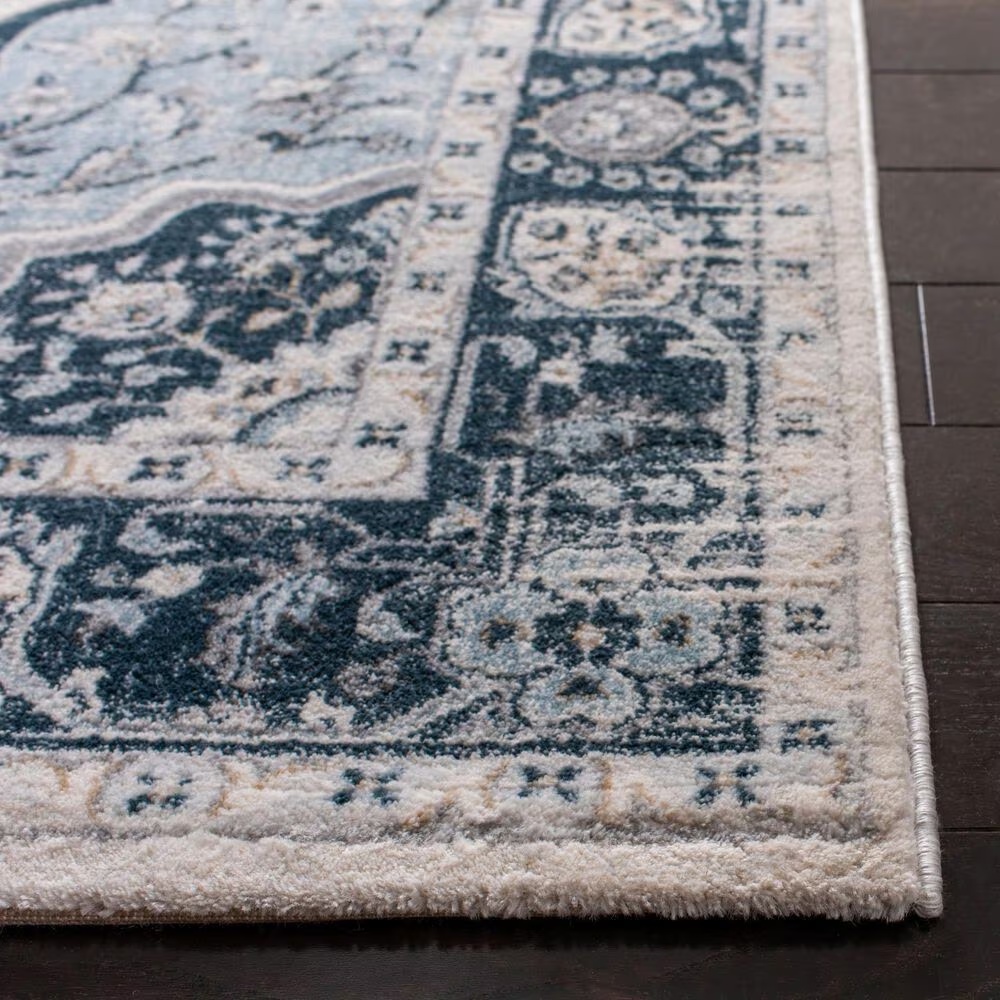 80717-safavieh-isabella-5-3-x-7-6-cream-and-light-blue-area-rug-1.jpg