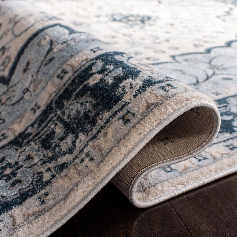 80717-safavieh-isabella-5-3-x-7-6-cream-and-light-blue-area-rug-1.jpg