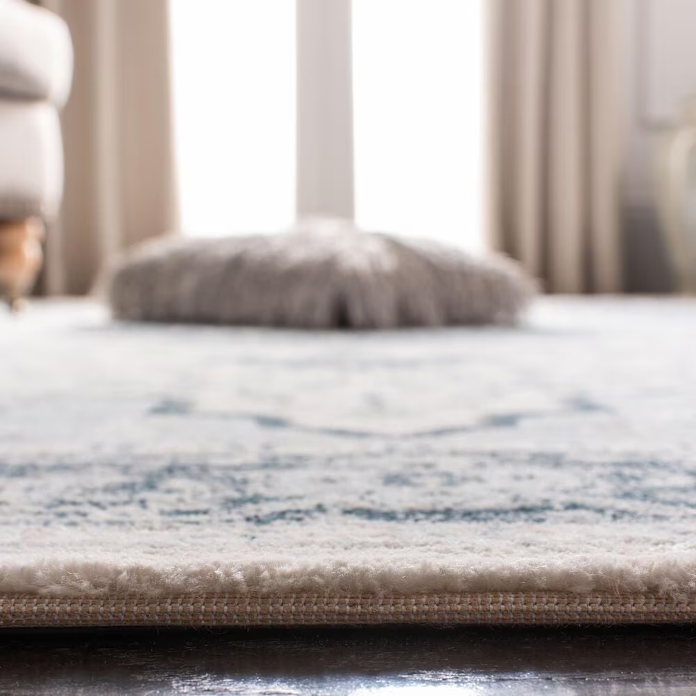 80717-safavieh-isabella-5-3-x-7-6-cream-and-light-blue-area-rug-1.jpg