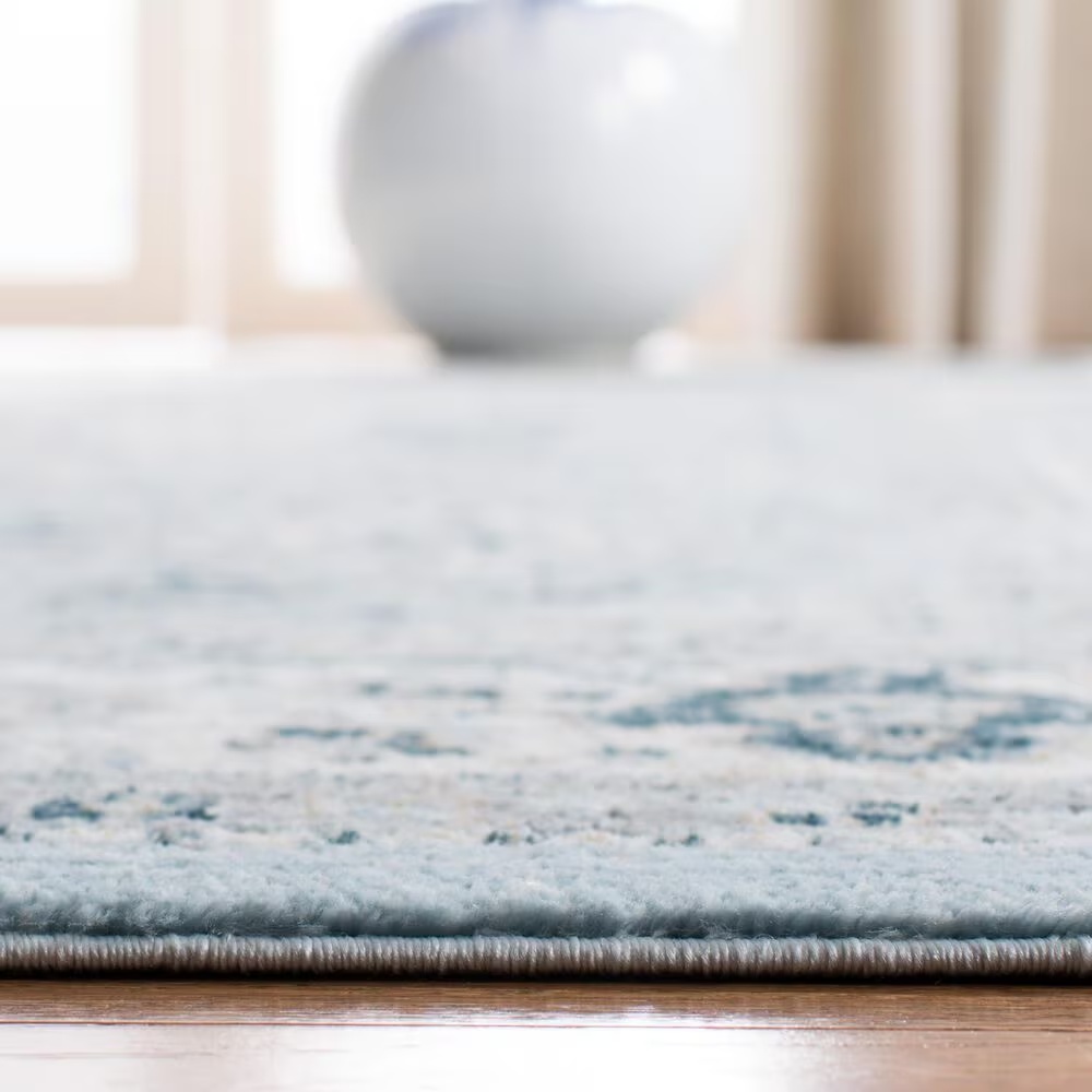 80776-safavieh-isabella-5-3-x-7-6-blue-and-creme-area-rug-1.jpg