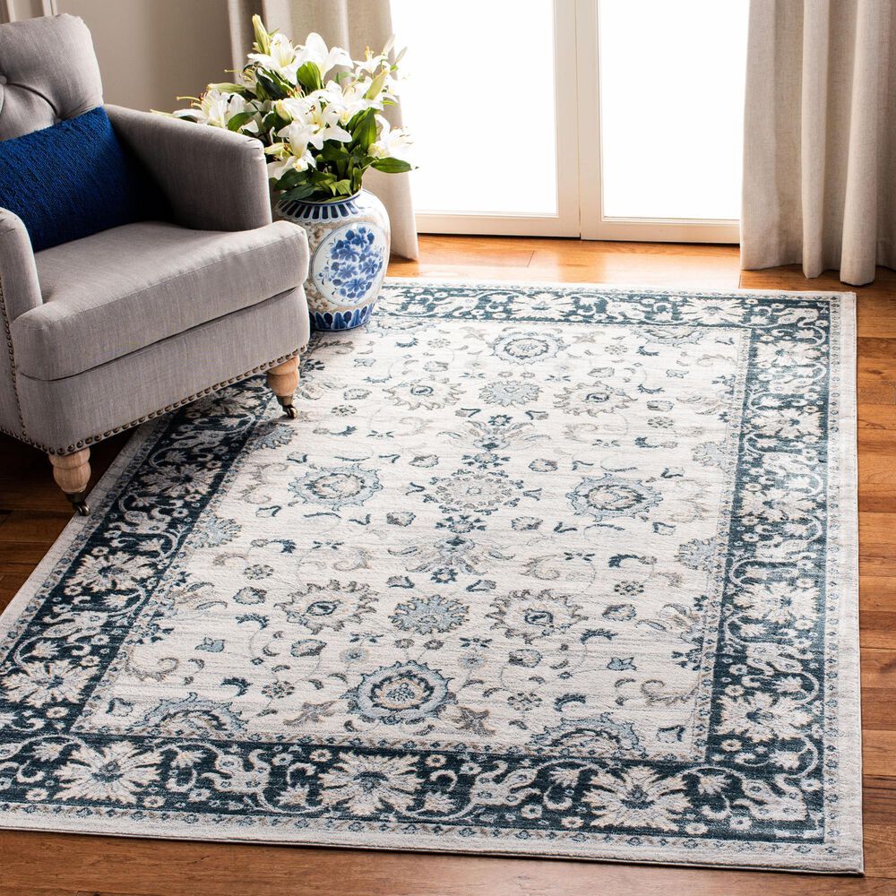 81136-safavieh-isabella-8-x-10-cream-and-navy-area-rug-1.jpg
