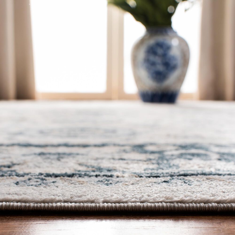 81136-safavieh-isabella-8-x-10-cream-and-navy-area-rug-1.jpg