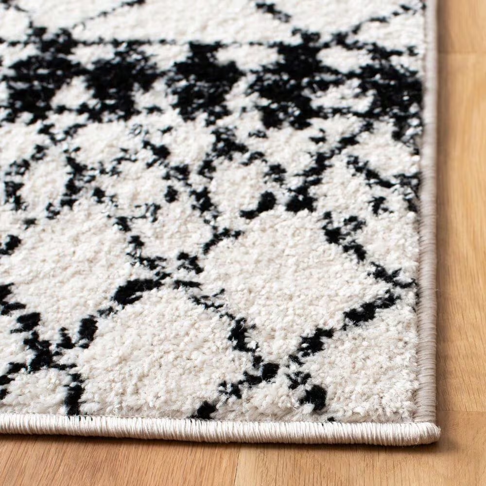 81462-safavieh-tulum6-7-square-ivory-and-black-area-rug-1.jpg