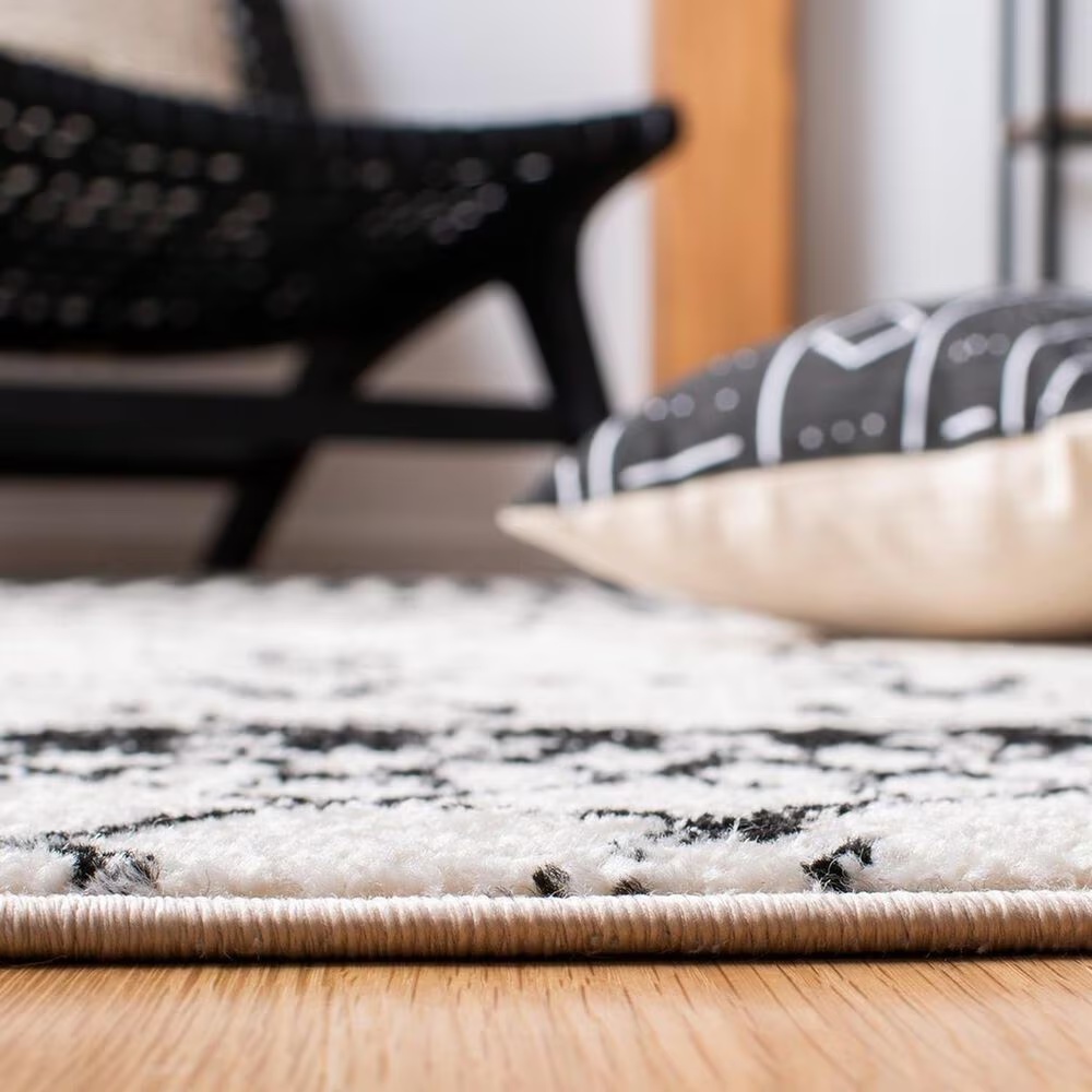 81462-safavieh-tulum6-7-square-ivory-and-black-area-rug-1.jpg