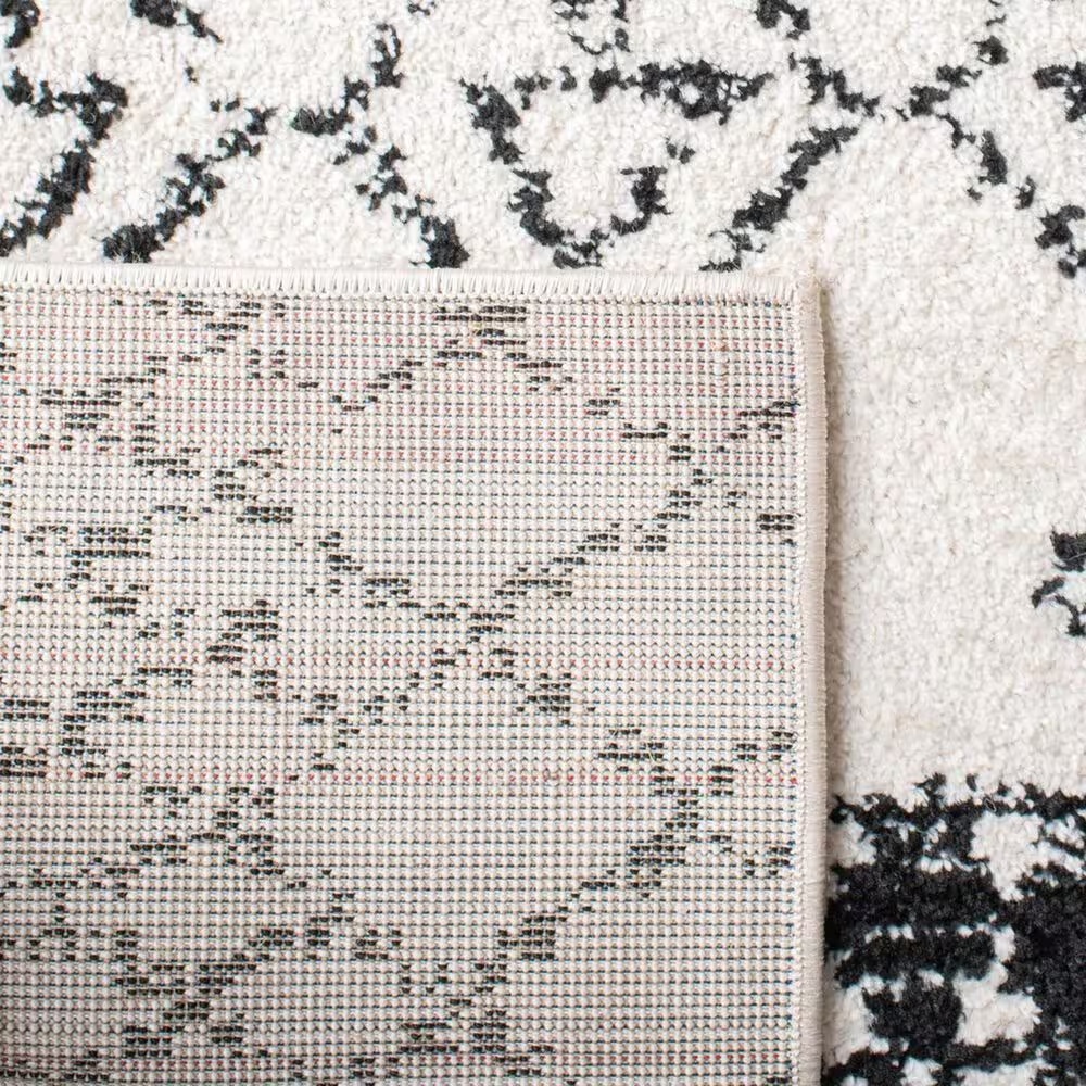 81474-safavieh-tulum-8-x-10-ivory-and-black-area-rug-1.jpg