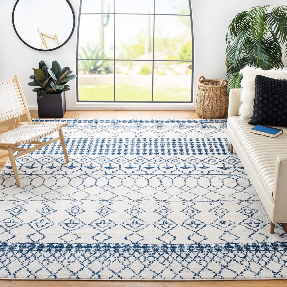 81650-safavieh-tulumtransitional-9-x-12-ivory-and-navy-area-rug-1.jpg
