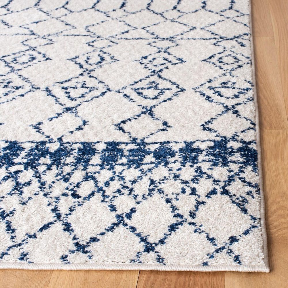 81650-safavieh-tulumtransitional-9-x-12-ivory-and-navy-area-rug-1.jpg
