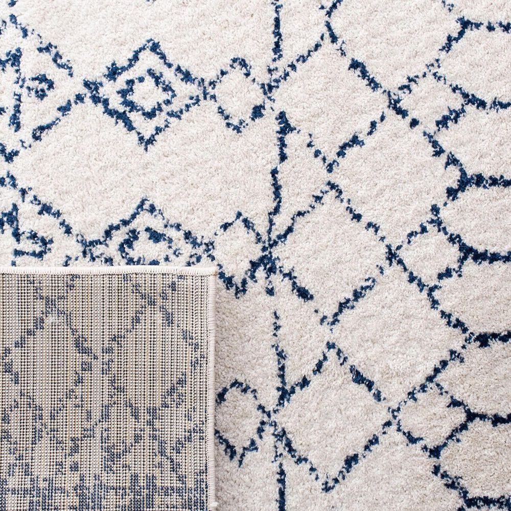 81650-safavieh-tulumtransitional-9-x-12-ivory-and-navy-area-rug-1.jpg