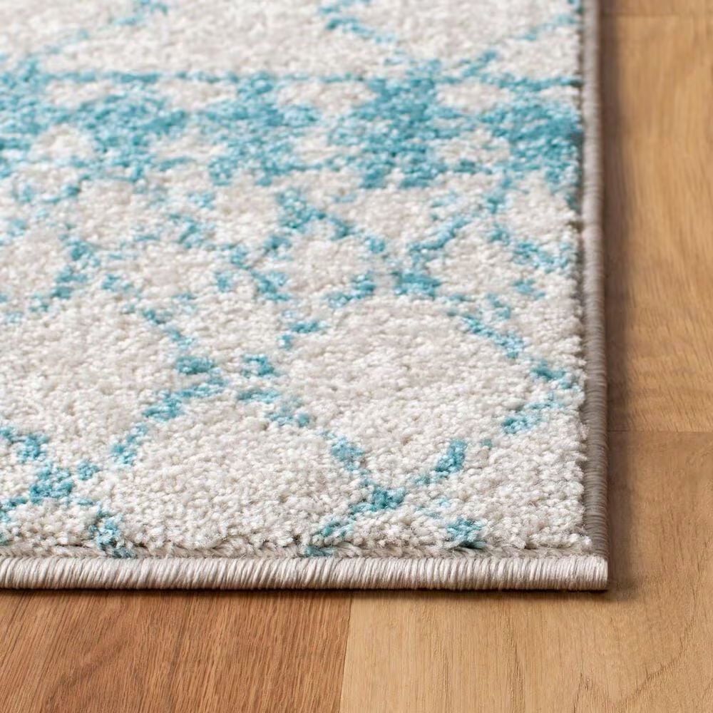 82047-safavieh-tulum-9-x-12-ivory-and-turquoise-area-rug-1.jpg