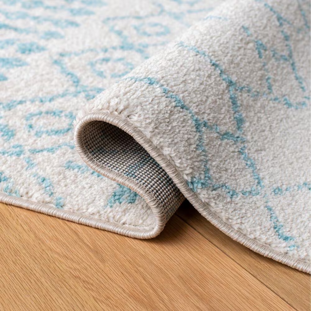 82047-safavieh-tulum-9-x-12-ivory-and-turquoise-area-rug-1.jpg