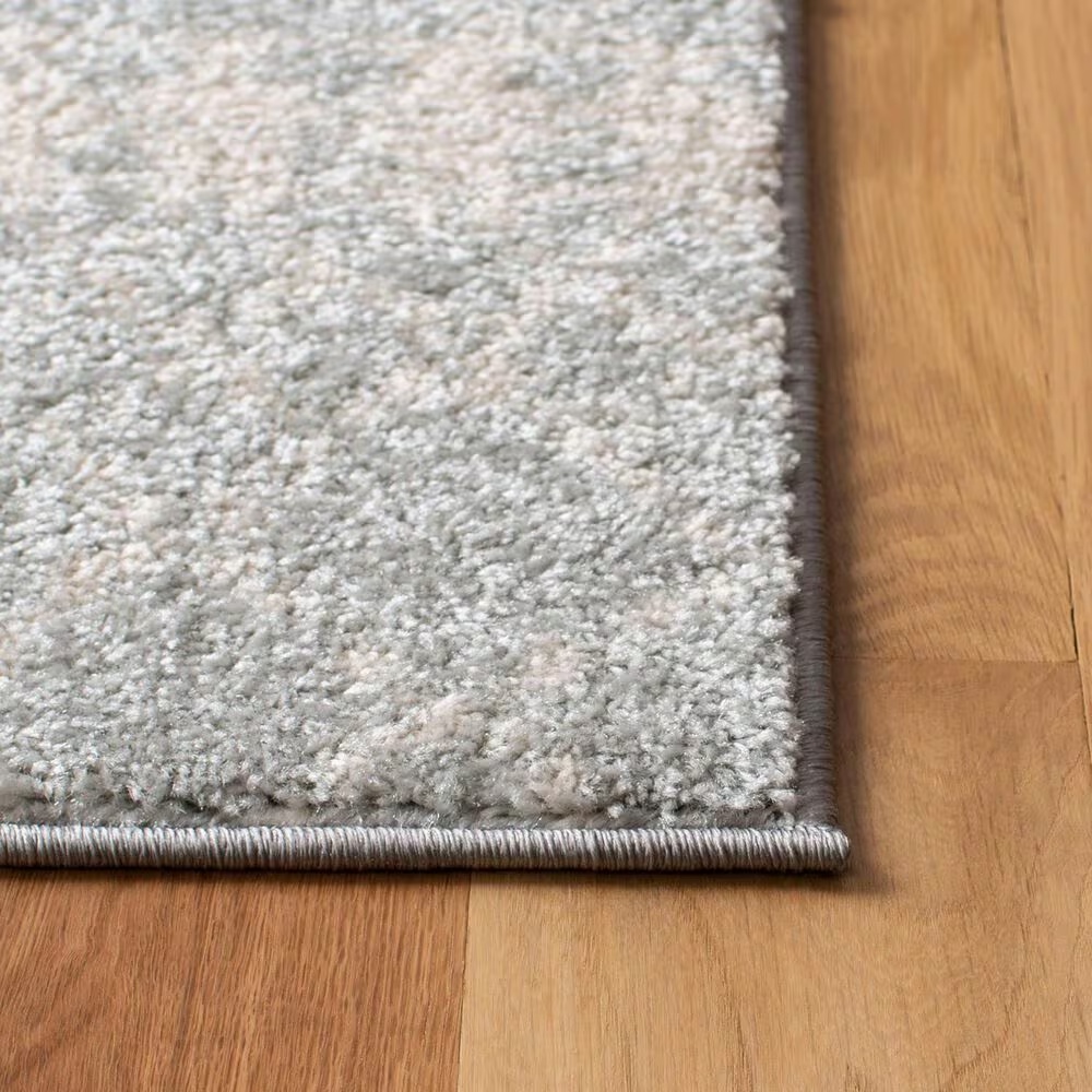 82059-safavieh-tulum-5-3-x-7-6-light-grey-and-ivory-area-rug-1.jpg