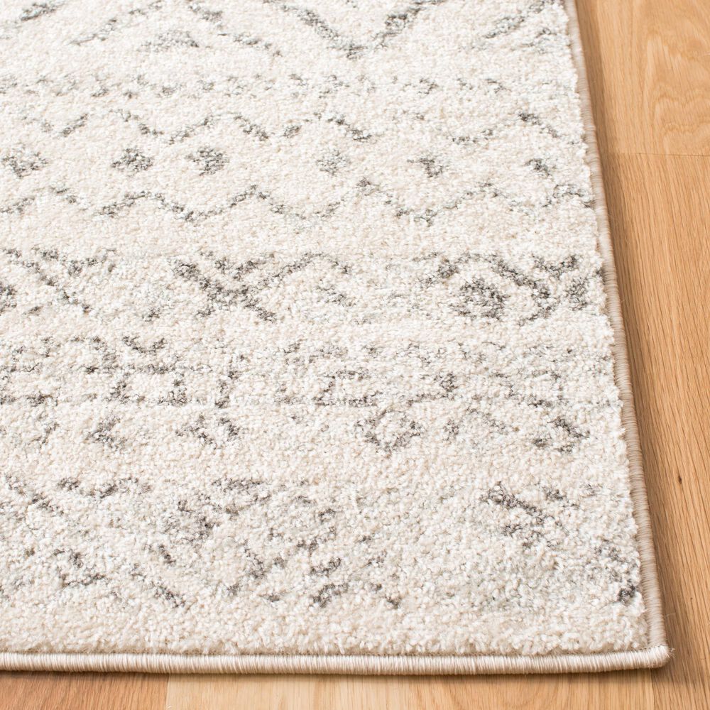 82472-safavieh-tulum-tul267a-5-3-x-7-6-ivory-and-grey-area-rug-1.jpg