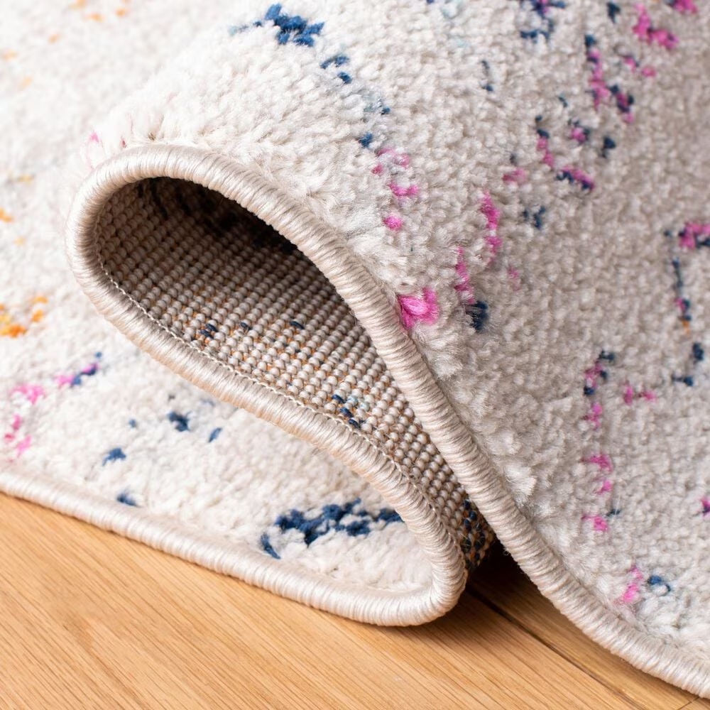 82741-safavieh-tulum-tul267e-4-x-6-ivory-and-fuchsia-area-rug-1.jpg