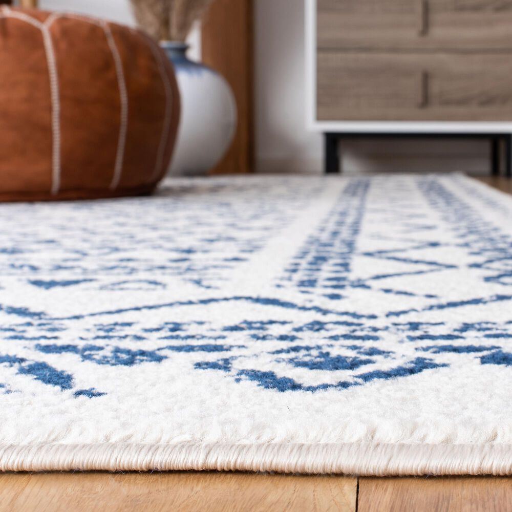 82856-safavieh-tulum-tul268c-6-x-9-ivory-and-navy-area-rug-1.jpg