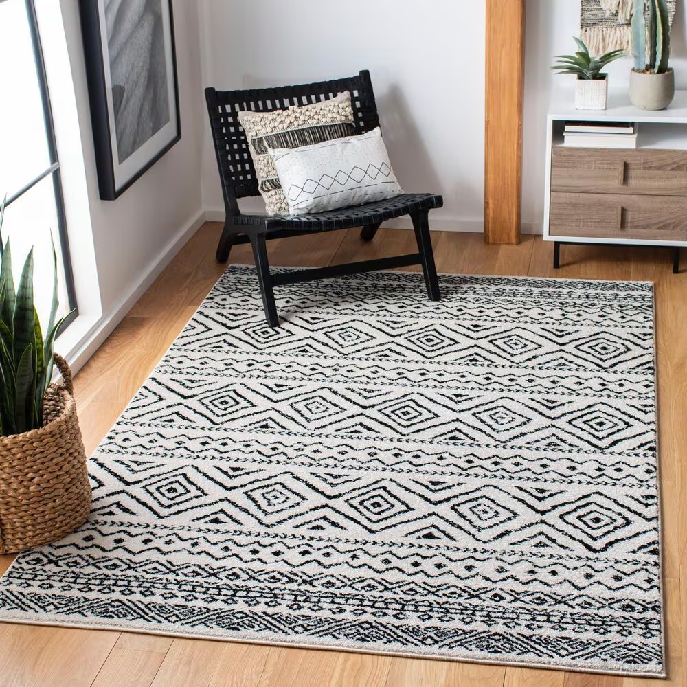 82981-safavieh-tulum-tul267-5-3-x-7-6-ivory-and-black-area-rug-1.jpg