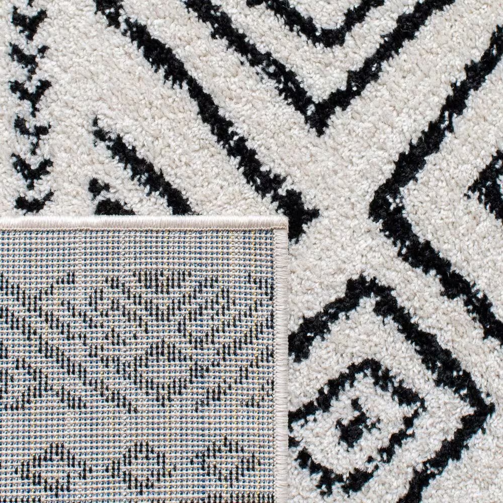 82981-safavieh-tulum-tul267-5-3-x-7-6-ivory-and-black-area-rug-1.jpg