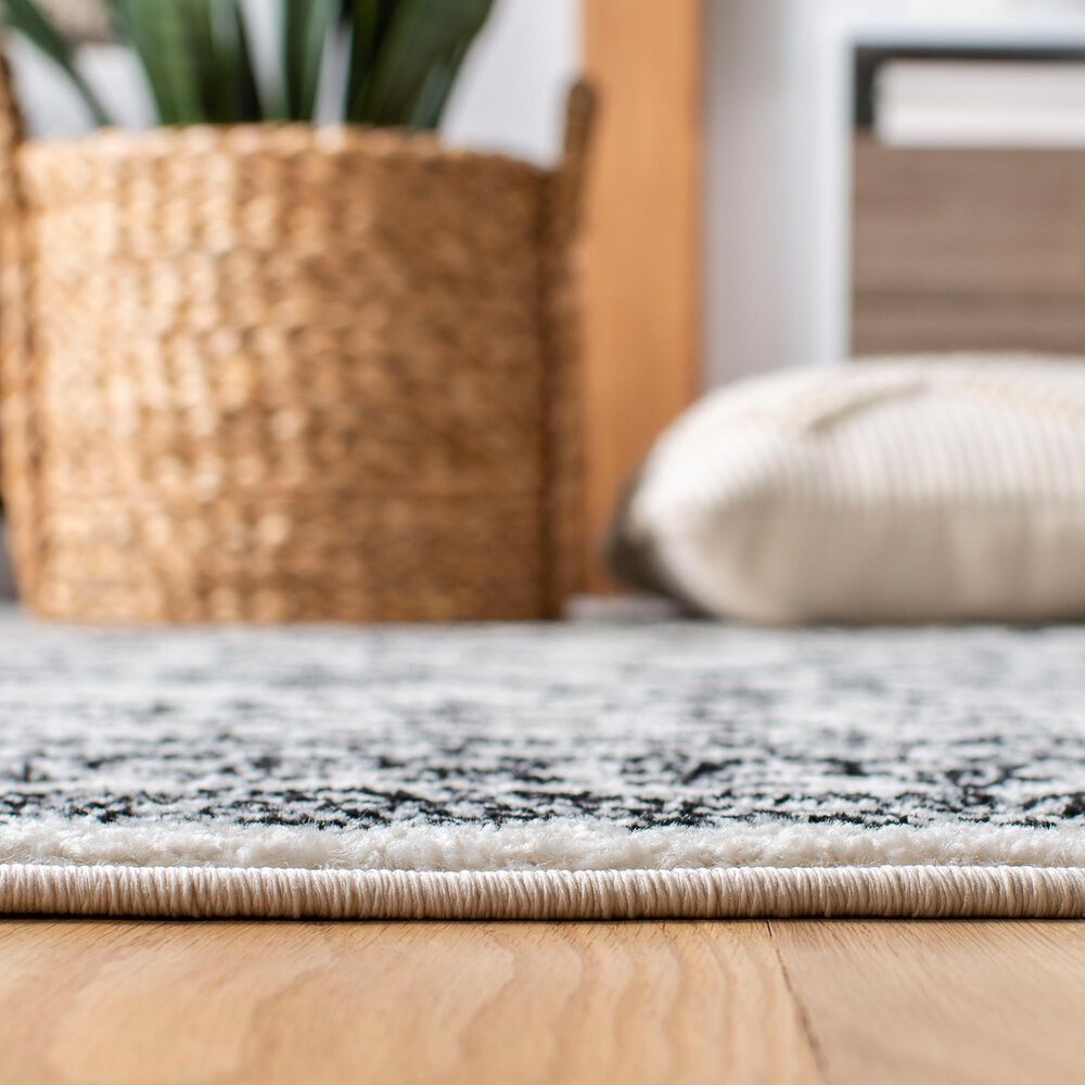82981-safavieh-tulum-tul267-5-3-x-7-6-ivory-and-black-area-rug-1.jpg
