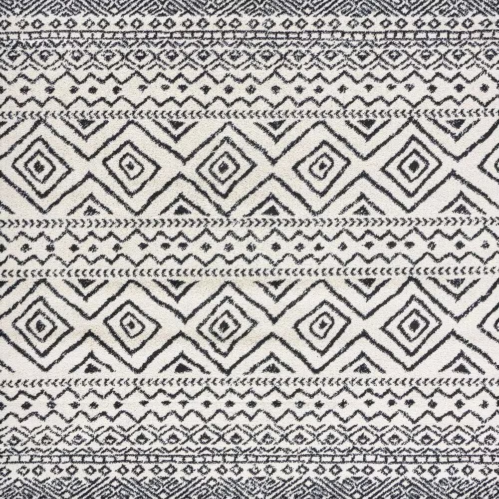 82981-safavieh-tulum-tul267-5-3-x-7-6-ivory-and-black-area-rug-1.jpg