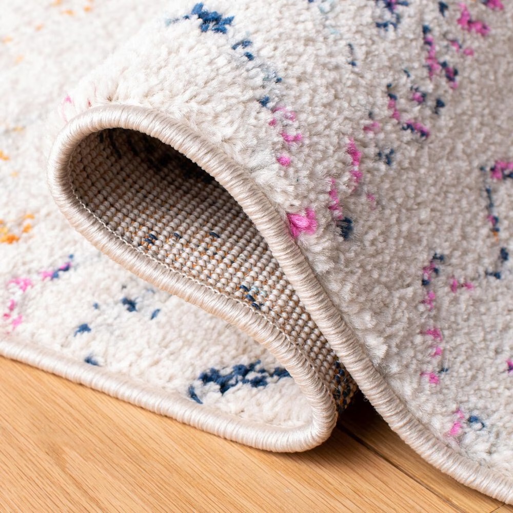 83000-safavieh-tulum-tul267e-9-x-12-ivory-and-fuchsia-area-rug-1.jpg