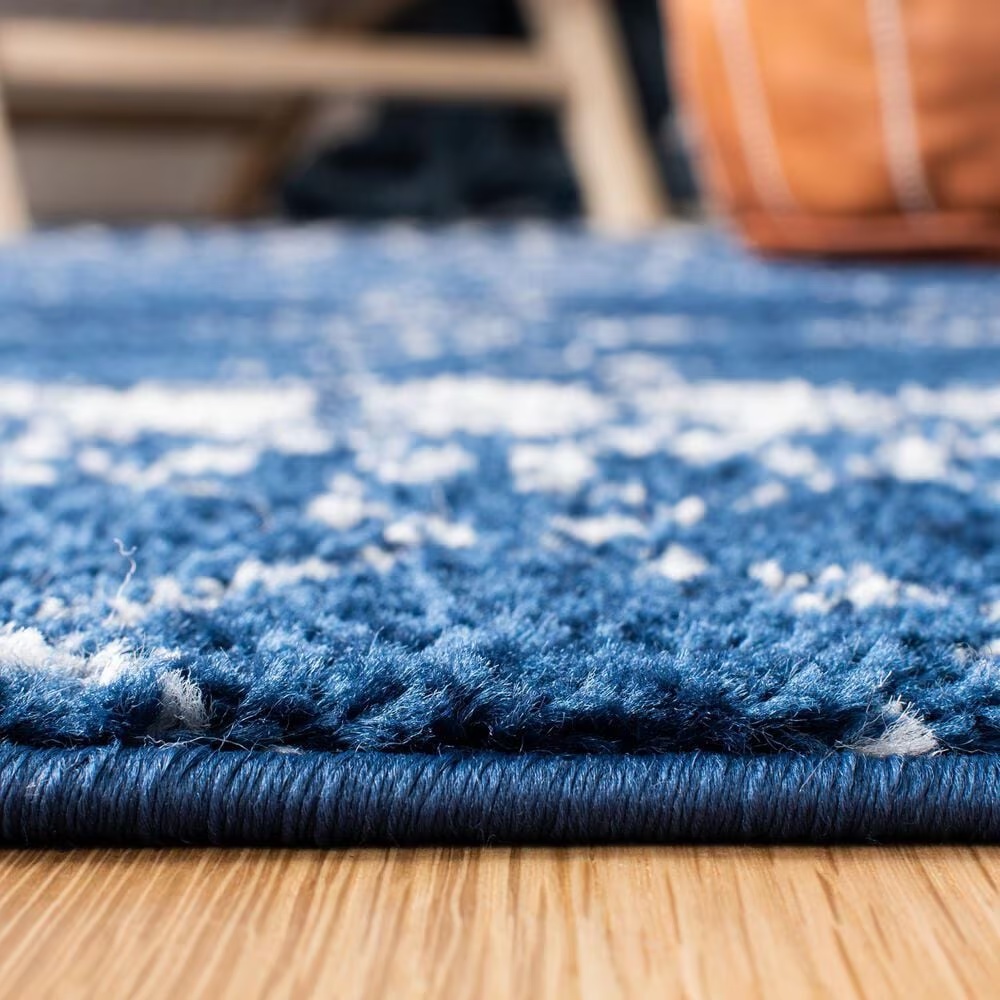 83062-safavieh-tulum-tul229n-10-x-13-navy-and-ivory-area-rug-1.jpg