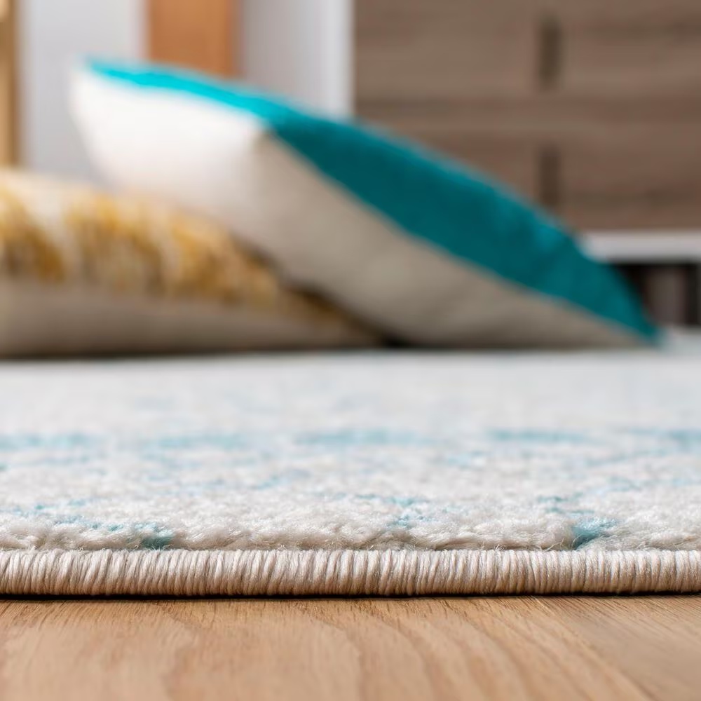 83098-safavieh-tulum-4-x-6-ivory-and-turquoise-area-rug-1.jpg