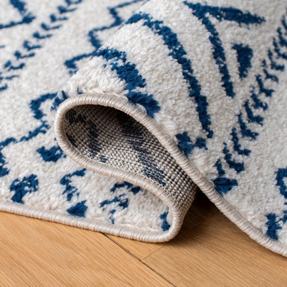 83110-safavieh-tulum-tul267-8-x-10-ivory-and-navy-area-rug-1.jpg