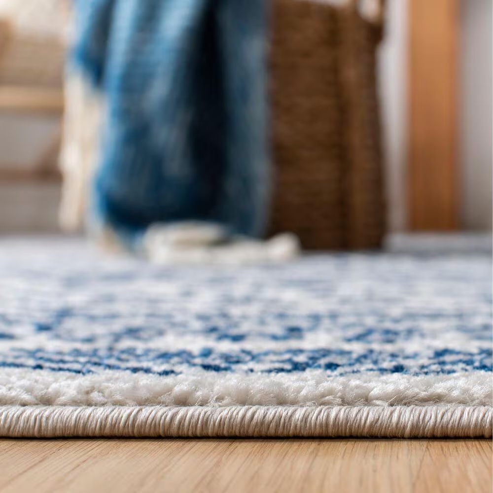 83110-safavieh-tulum-tul267-8-x-10-ivory-and-navy-area-rug-1.jpg