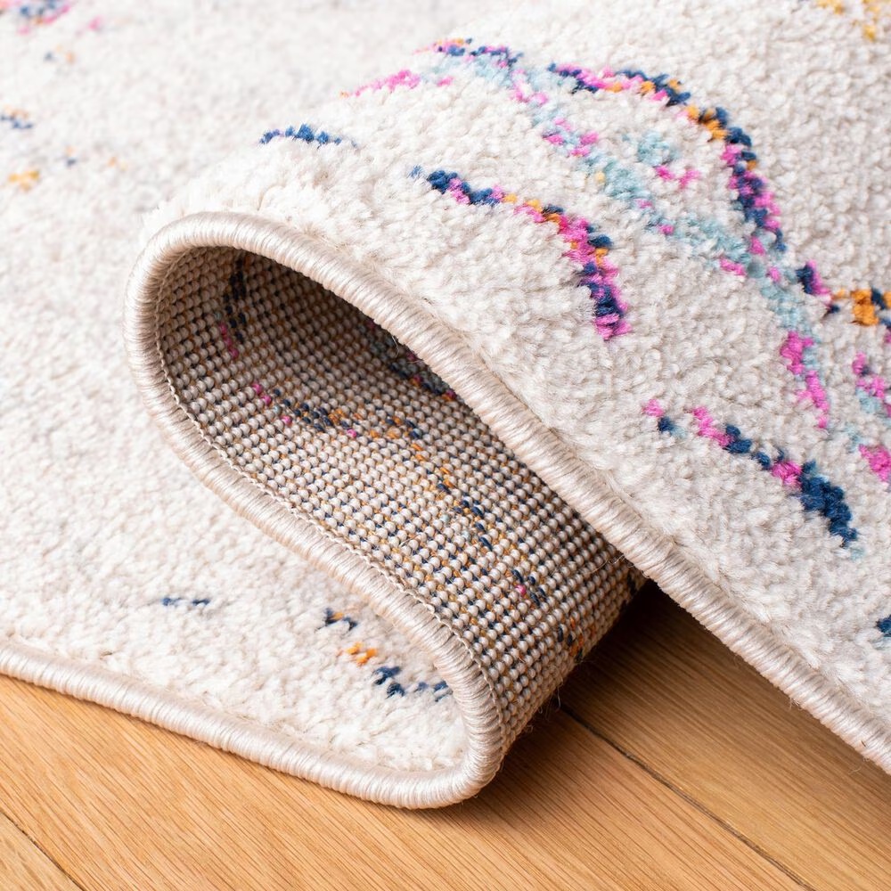 83270-safavieh-tulum-tul268e-5-3-x-7-6-ivory-and-fuchsia-area-rug-1.jpg