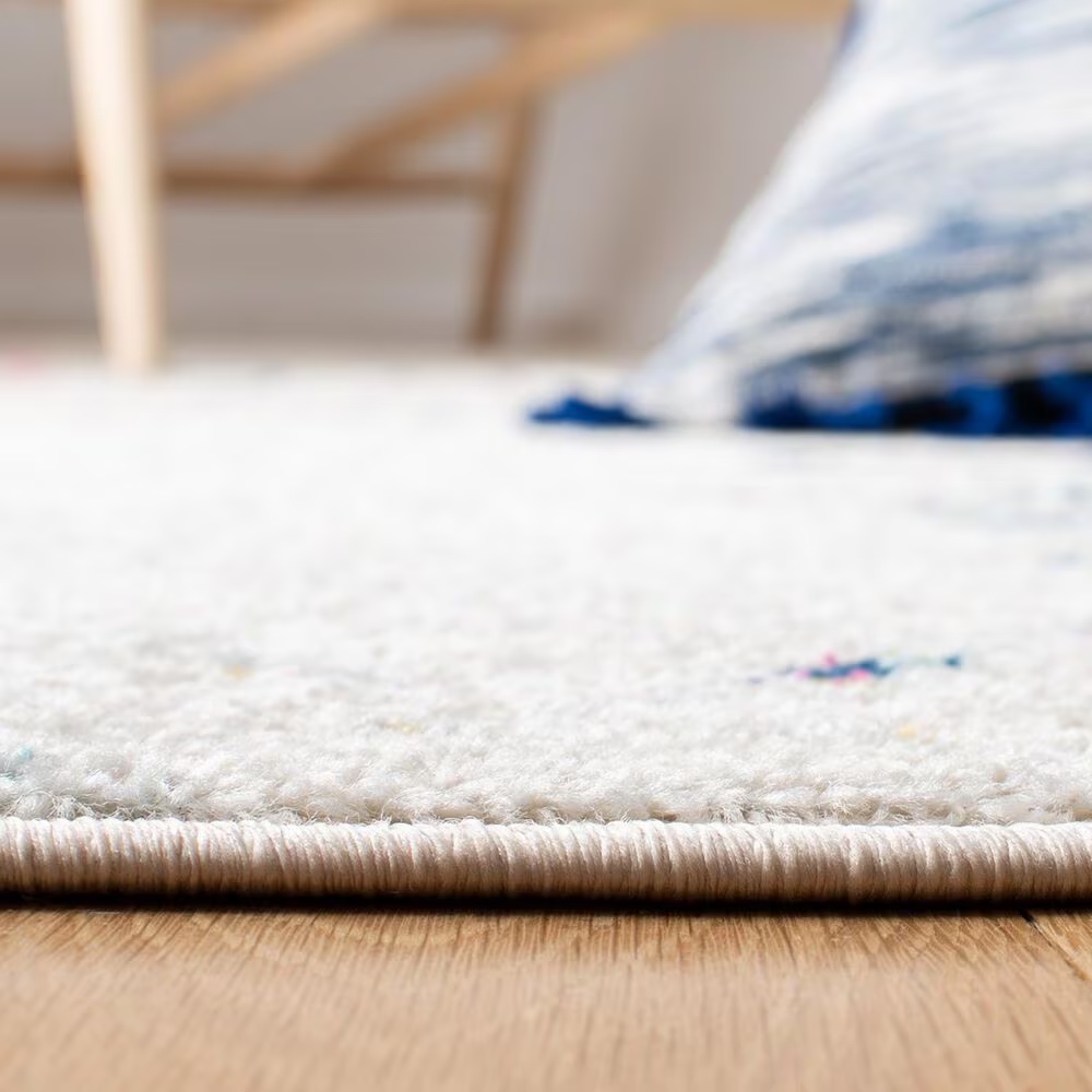 83585-safavieh-tulum-9-x-12-ivory-and-blue-area-rug-1.jpg