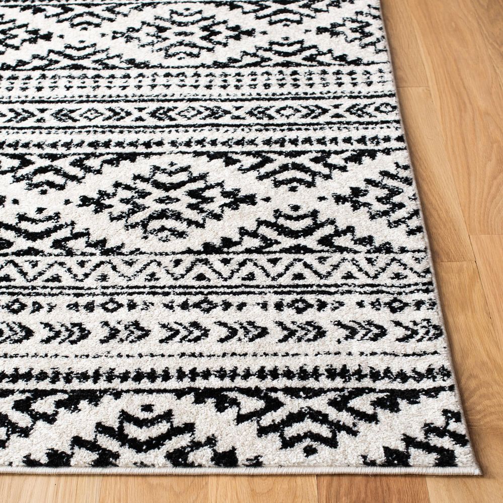 83663-safavieh-tulum-tul272b-5-3-x-7-6-ivory-and-black-area-rug-1.jpg
