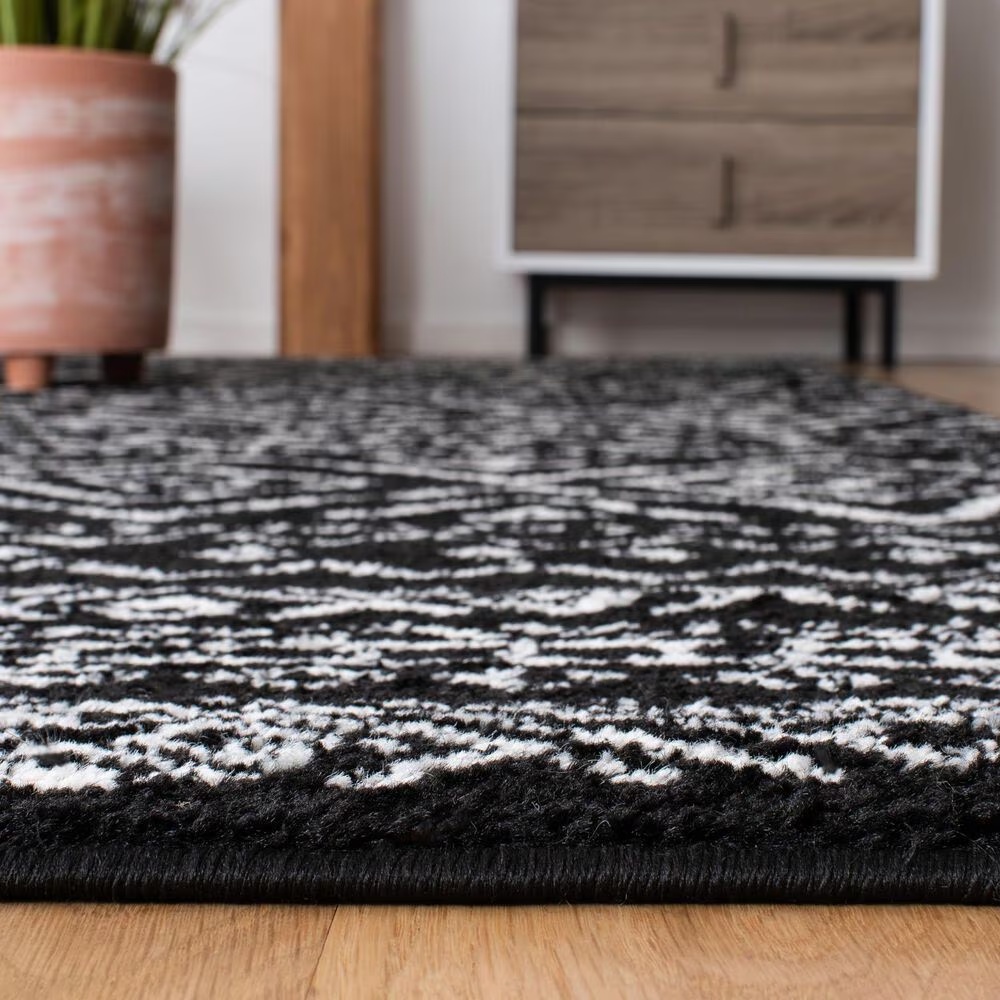 83851-safavieh-tulum-tul267z-4-x-6-black-and-ivory-area-rug-1.jpg