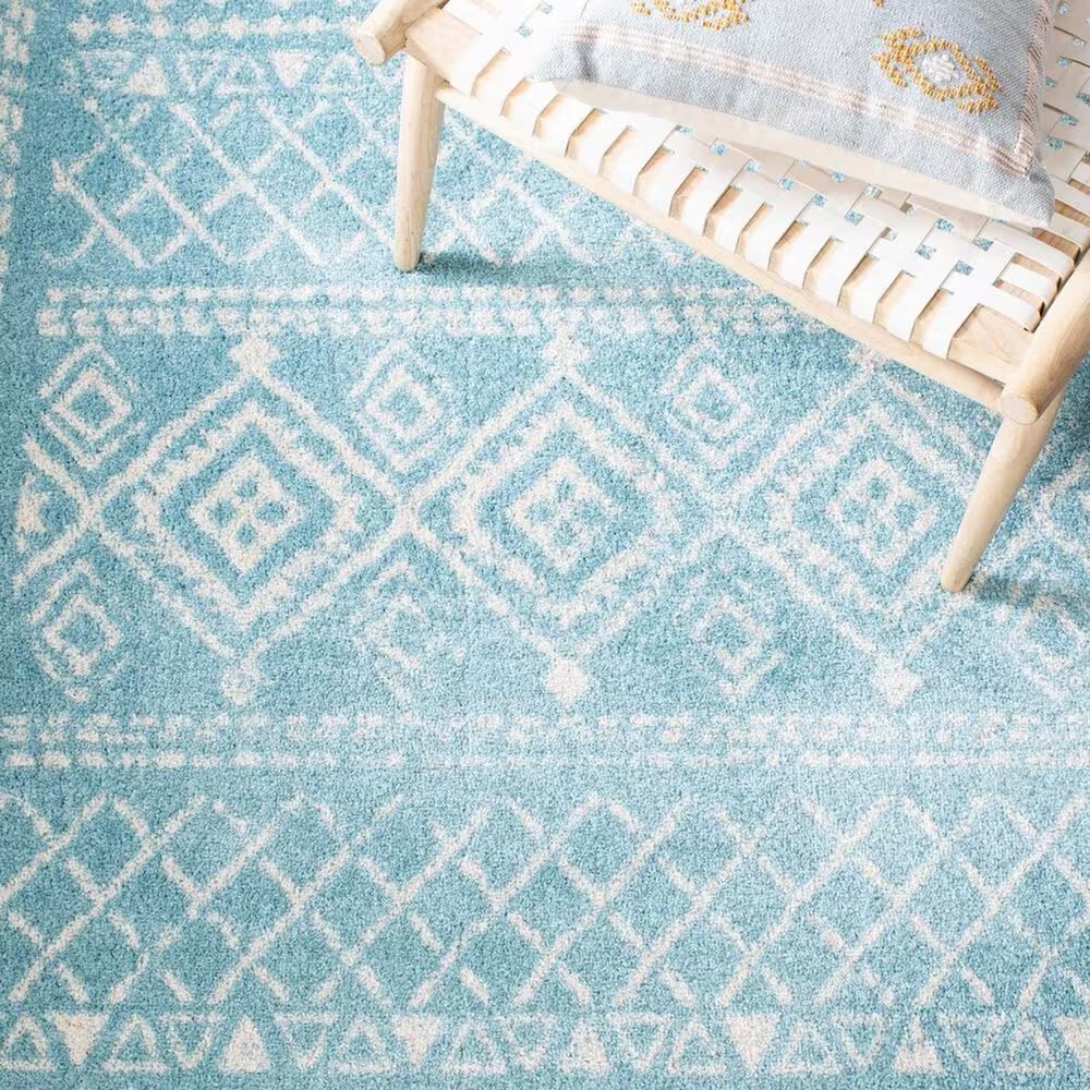 83861-safavieh-tulum-tul268k-5-3-x-7-6-turquoise-and-ivory-area-rug-1.jpg