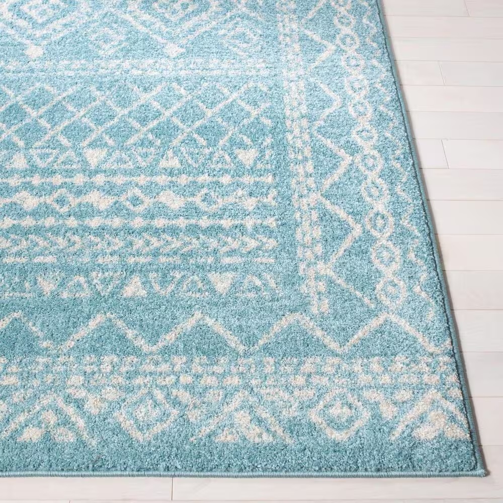 83861-safavieh-tulum-tul268k-5-3-x-7-6-turquoise-and-ivory-area-rug-1.jpg
