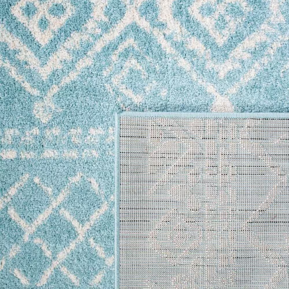 83861-safavieh-tulum-tul268k-5-3-x-7-6-turquoise-and-ivory-area-rug-1.jpg