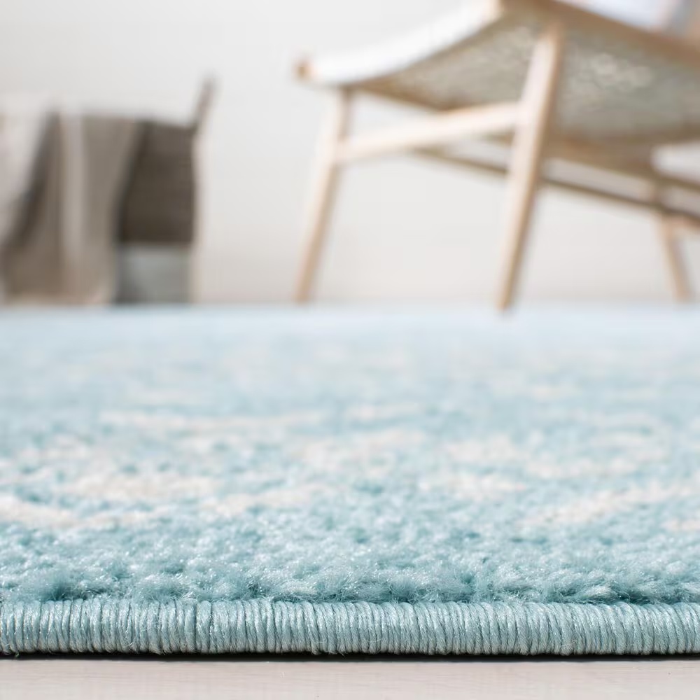 83861-safavieh-tulum-tul268k-5-3-x-7-6-turquoise-and-ivory-area-rug-1.jpg