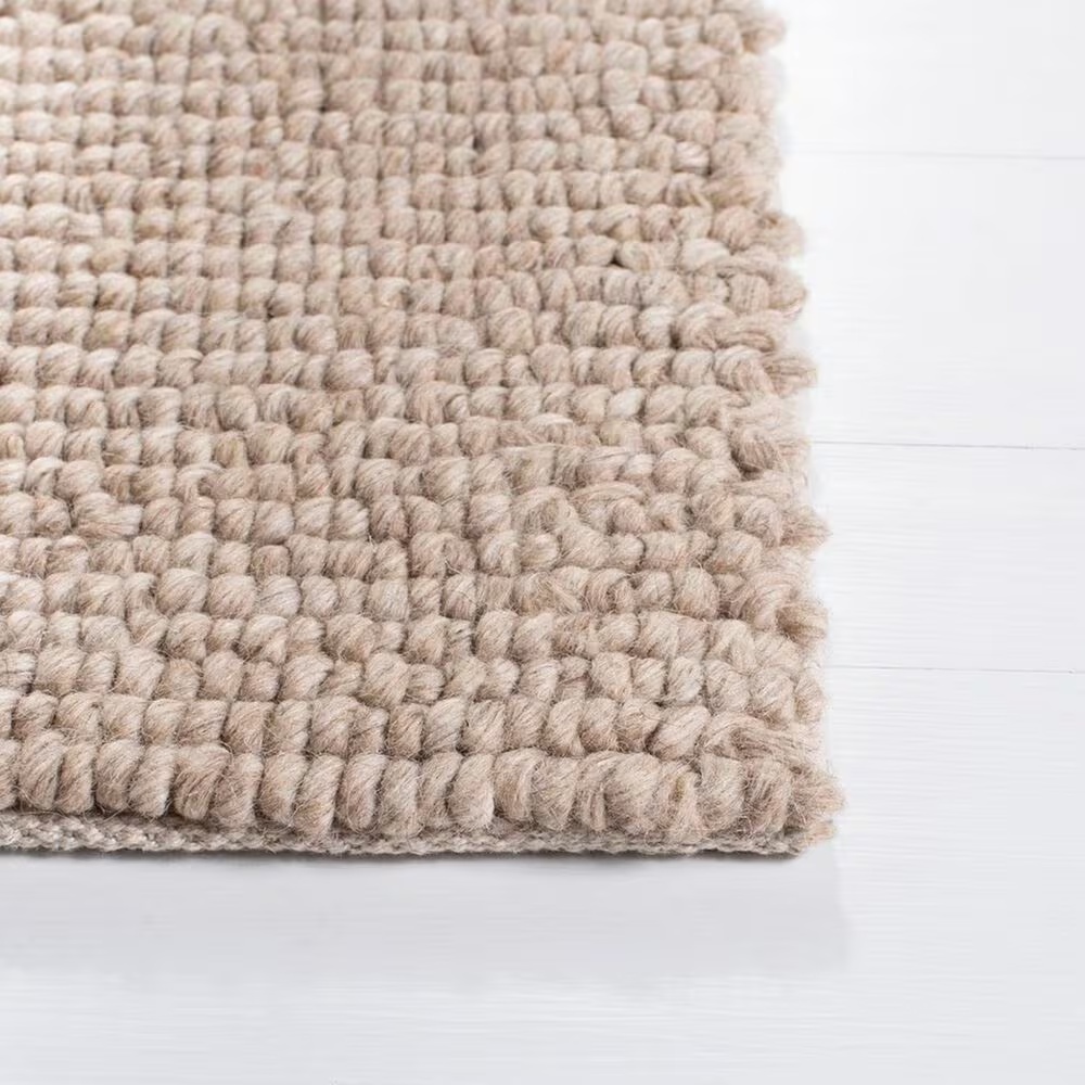 84344-safavieh-natura-nat217a-5-x-8-beige-area-rug-1.jpg