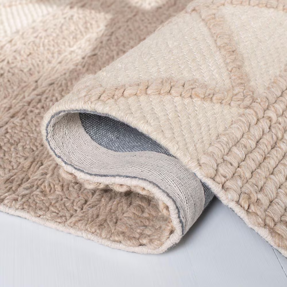 84344-safavieh-natura-nat217a-5-x-8-beige-area-rug-1.jpg