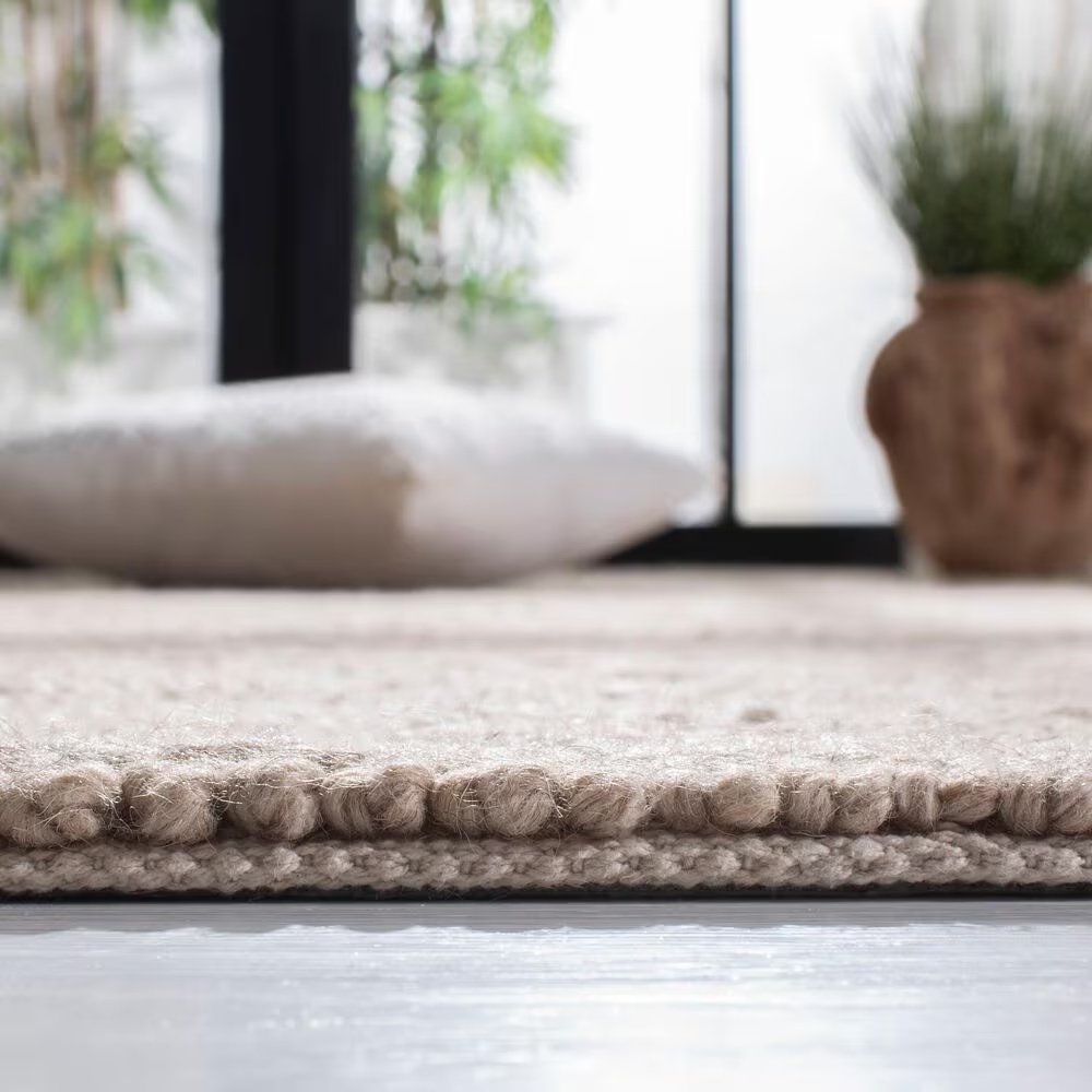 84344-safavieh-natura-nat217a-5-x-8-beige-area-rug-1.jpg