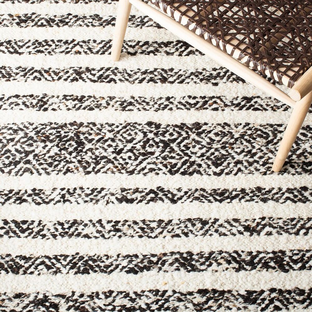 84669-safavieh-natura-nat329z-5-x-8-black-and-ivory-area-rug-1.jpg