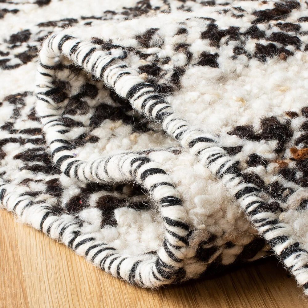 84669-safavieh-natura-nat329z-5-x-8-black-and-ivory-area-rug-1.jpg